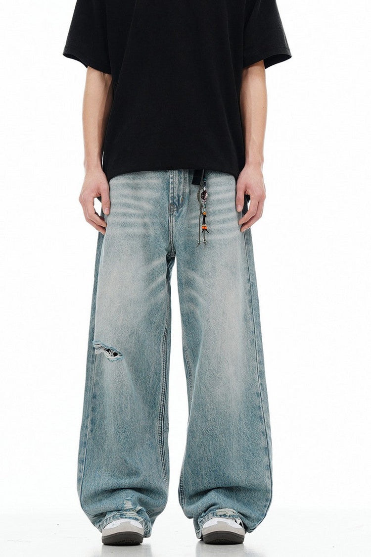 Distressed Light Wash Jeans — Trenqor Basics