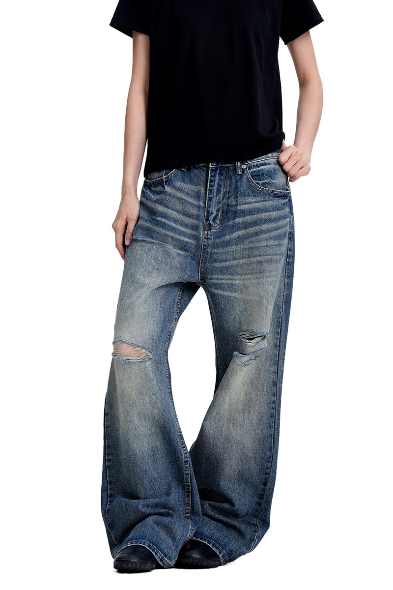 Ripped Whisker Jeans