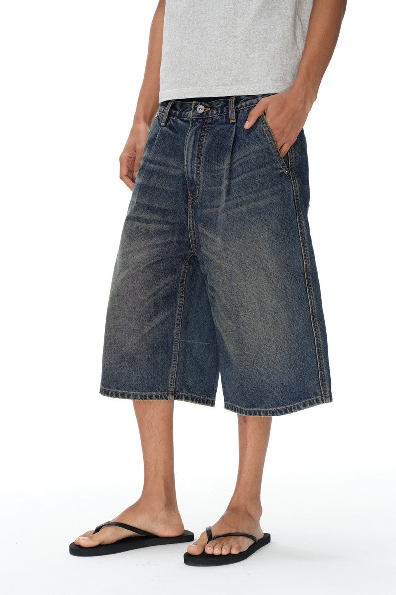 Distressed Pleated Denim Shorts