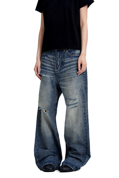 Ripped Whisker Jeans